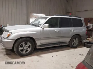 2007 Toyota Land Cruiser z VIN JTEHT05J972108283, wystawiony jako IAAI lot #41476536 z przebiegiem 212 693 mil mil oraz . Historia ofert i sprzedaży dostępna na DreamBid. Obrazek 14.