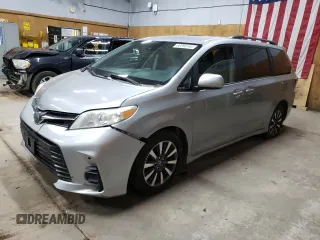 2018 Toyota Sienna LE with VIN 5TDJZ3DC2JS197865, listed as a Copart auction lot 68896164 with 449,127 mi miles and Clean title. Bid and sale history available at DreamBid. Image 1.