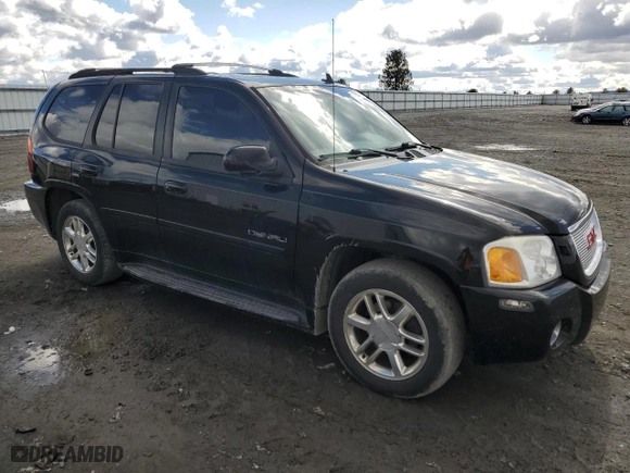 2006 GMC Envoy Denali with VIN 1GKET63M362172474, listed as a Copart auction lot 48956715 with 182,961 mi miles and Clean Title. Bid and sale history available at carsss.com. Image 4.