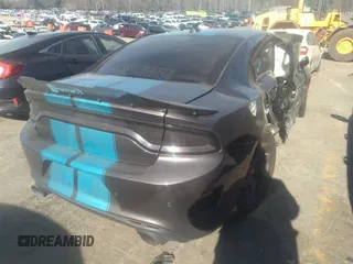 2023 Dodge Charger R/T with VIN 2C3CDXCT7PH576212, listed as a IAAI auction lot 41285793 with 37,471 mi miles and . Bid and sale history available at DreamBid. Image 4.