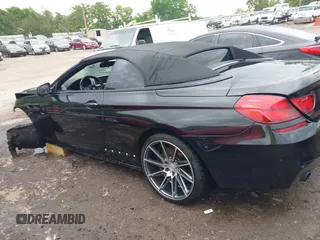 2014 BMW 6 Series 640i z VIN WBALW7C5XED595934, wystawiony jako IAAI lot #42092380 z przebiegiem Nie podano mil oraz . Historia ofert i sprzedaży dostępna na DreamBid. Obrazek 13.