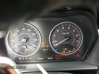 2016 BMW 2 Series M235i xDrive with VIN WBA1J9C52GV372057, listed as a Copart auction lot 71236354 with 89,420 mi miles and Salvage Title. Bid and sale history available at carsss.com. Image 9.