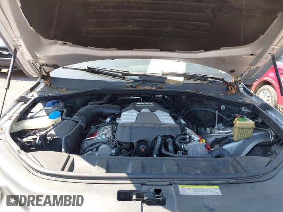 2014 Audi Q7 Premium Plus with VIN WA1LGAFE6ED017090, listed as a IAAI auction lot 42578109 with 145,357 mi miles and . Bid and sale history available at DreamBid. Image 10.