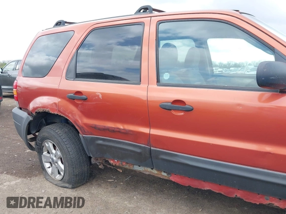 2006 Ford Escape XLT with VIN 1FMYU03126KA17323, listed as a IAAI auction lot 42048363 with 119,296 mi miles and . Bid and sale history available at DreamBid. Image 6.