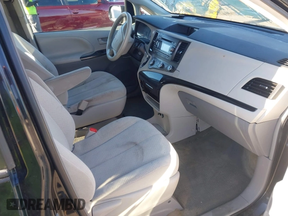 2012 Toyota Sienna with VIN 5TDKA3DC4CS013590, listed as a IAAI auction lot 41423163 with 109,845 mi miles and . Bid and sale history available at DreamBid. Image 5.