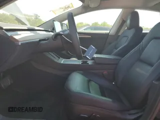 2023 Tesla Model 3 z VIN 5YJ3E1EA1PF547070, wystawiony jako Copart lot #55793205 z przebiegiem 38 591 mil mil oraz Szkoda całkowita • Salvage title. Historia ofert i sprzedaży dostępna na DreamBid. Obrazek 7.