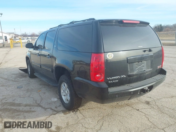 2014 GMC Yukon XL SLT with VIN 1GKS2KE74ER213562, listed as a IAAI auction lot 41493559 with 253,616 mi miles. Bid and sale history available at carsss.com. Image 3.