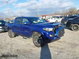 2023 Toyota Tacoma 4WD SR with VIN 3TYCZ5AN1PT119133, listed as a IAAI auction lot 41574906 with 19,887 mi miles. Bid and sale history available at carsss.com. Image 1.