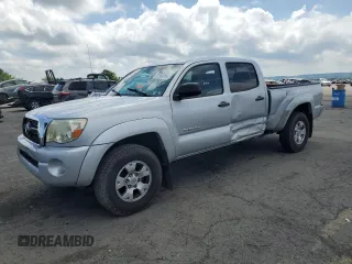 2011 Toyota Tacoma with VIN 3TMMU4FN3BM035762, listed as a Copart auction lot 61583045 with 148,634 mi miles and Salvage title. Bid and sale history available at DreamBid. Image 1.