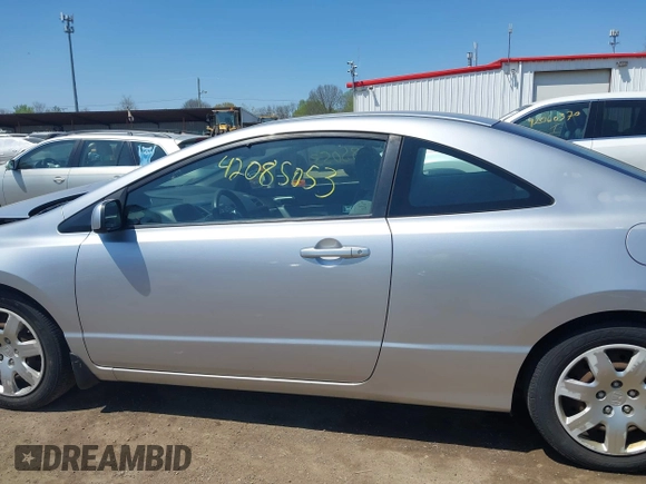 2010 Honda Civic Cpe LX with VIN 2HGFG1B67AH535385, listed as a IAAI auction lot 42085053 with 150,803 mi miles. Bid and sale history available at carsss.com. Image 14.