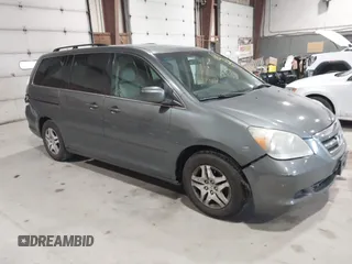 2007 Honda Odyssey EX-L z VIN 5FNRL38697B419081, wystawiony jako IAAI lot #41750106 z przebiegiem 168 927 mil mil oraz . Historia ofert i sprzedaży dostępna na DreamBid. Obrazek 1.