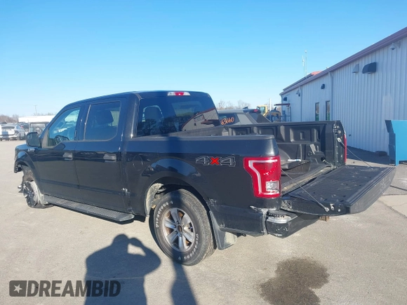 2015 Ford F-150 XLT with VIN 1FTEW1E86FFC00959, listed as a IAAI auction lot 41581711 with 130,298 mi miles. Bid and sale history available at carsss.com. Image 3.