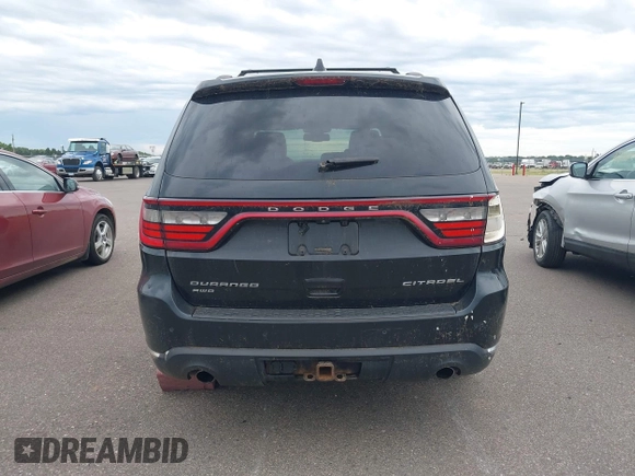 2014 Dodge Durango Citadel with VIN 1C4SDJET5EC314304, listed as a IAAI auction lot 42682540 with 213,651 mi miles and . Bid and sale history available at DreamBid. Image 16.