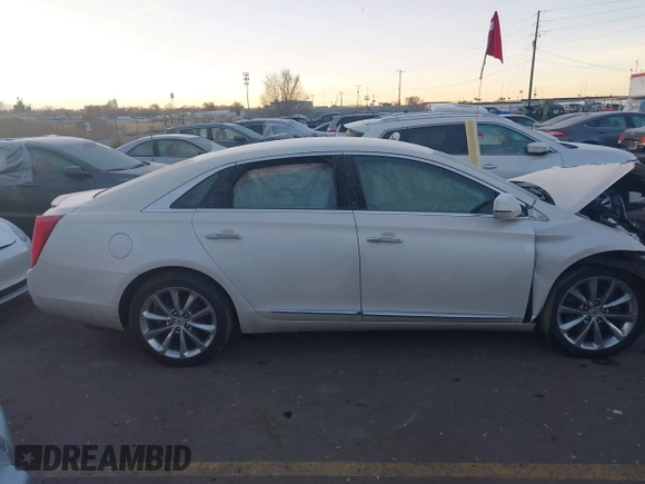 2014 Cadillac XTS Premium with VIN 2G61P5S30E9123057, listed as a IAAI auction lot 41301457 with 123,042 mi miles and . Bid and sale history available at DreamBid. Image 13.