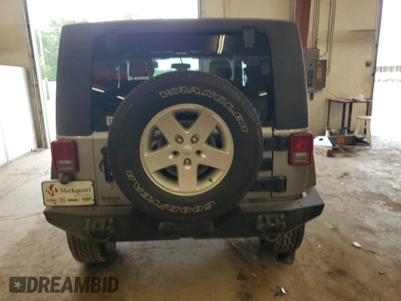 2013 Jeep Wrangler Sport with VIN 1C4GJWAG4DL559422, listed as a Copart auction lot 61454805 with 132,509 mi miles and Salvage title. Bid and sale history available at DreamBid. Image 6.
