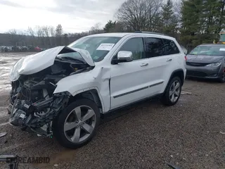2015 Jeep Grand Cherokee Limited with VIN 1C4RJFBG3FC671803, listed as a IAAI auction lot 41224584 with 110,589 mi miles. Bid and sale history available at carsss.com. Image 2.