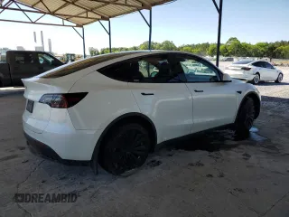 2024 Tesla Model Y с VIN 7SAYGDED5RF086456, выставлен на аукционе Copart как лот 57994835 с пробегом Не указан миль и Списание • Salvage title. История ставок и продаж доступна на DreamBid. Изображение 3.
