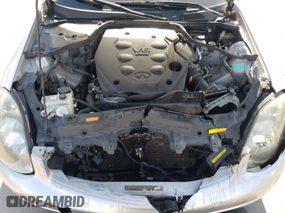 2003 Infiniti G35 w/Leather with VIN JNKCV51E73M314861, listed as a Copart auction lot 74924954 with 70,886 mi miles and Salvage Title. Bid and sale history available at DreamBid. Image 12.