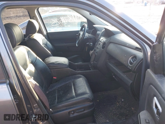 2012 Honda Pilot EX-L with VIN 5FNYF4H52CB034259, listed as a IAAI auction lot 41871625 with 159,577 mi miles and . Bid and sale history available at carsss.com. Image 5.