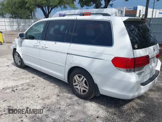 2010 Honda Odyssey EX with VIN 5FNRL3H5XAB015351, listed as a IAAI auction lot 42702296 with 202,919 mi miles and . Bid and sale history available at DreamBid. Image 3.