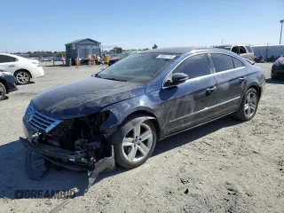 2014 Volkswagen CC Sport with VIN WVWBP7AN1EE506177, listed as a Copart auction lot 76997114 with 117,039 mi miles and Salvage Title. Bid and sale history available at carsss.com. Image 1.
