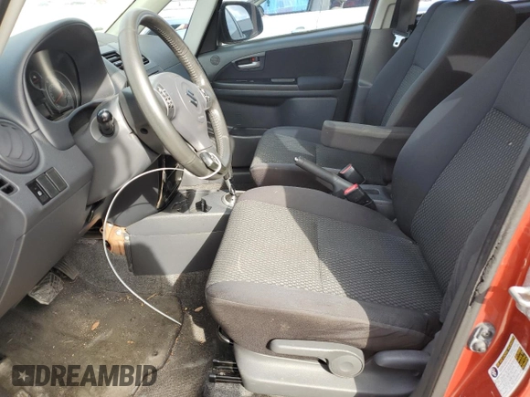 2013 Suzuki SX4 with VIN JS2YB5A42D6100038, listed as a Copart auction lot 73148344 with 141,675 mi miles and Salvage Title. Bid and sale history available at DreamBid. Image 7.