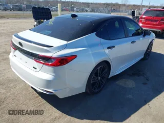 2025 Toyota Camry LE with VIN 4T1DAACK7SU033649, listed as a IAAI auction lot 41823097 with 9,392 mi miles and . Bid and sale history available at carsss.com. Image 4.