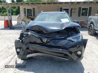 2018 Toyota RAV4 XLE z VIN 2T3WFREVXJW491725, wystawiony jako IAAI lot #42216365 z przebiegiem 76 365 mil mil oraz . Historia ofert i sprzedaży dostępna na DreamBid. Obrazek 12.