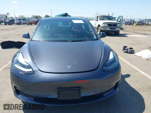 2022 Tesla Model 3 with VIN 5YJ3E1EA6NF144098, listed as a IAAI auction lot 41965360 with 75,597 mi miles. Bid and sale history available at carsss.com. Image 12.