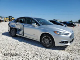 2013 Ford Fusion Titanium Hybrid with VIN 3FA6P0RUXDR375739, listed as a Copart auction lot 52332165 with 162,524 mi miles and Salvage Title. Bid and sale history available at DreamBid. Image 4.