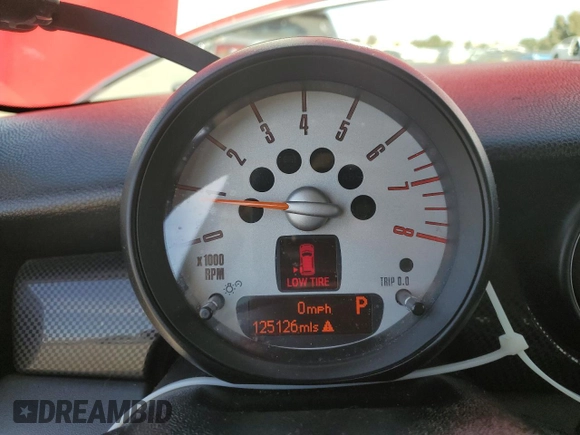 2011 MINI Hardtop S with VIN WMWSV3C50BTY12562, listed as a Copart auction lot 61183425 with 125,126 mi miles and Salvage title. Bid and sale history available at DreamBid. Image 9.