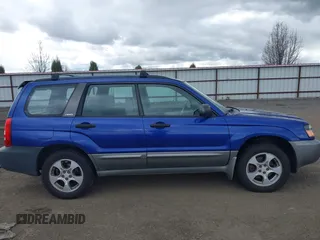2003 Subaru Forester XS with VIN JF1SG65643H715427, listed as a IAAI auction lot 41935620 with 248,726 mi miles. Bid and sale history available at carsss.com. Image 13.