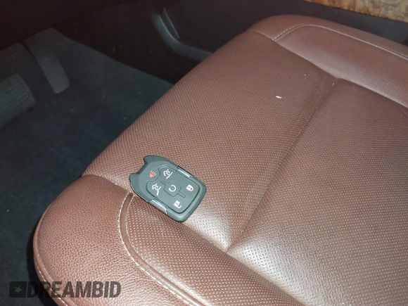 2019 Chevrolet Suburban Premier with VIN 1GNSKJKJ2KR354283, listed as a IAAI auction lot 39548082 with Not Provided miles and . Bid and sale history available at DreamBid. Image 11.