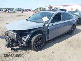 2022 Honda Civic Sport Touring z VIN 19XFL1H82NE003000, wystawiony jako IAAI lot #42020685 z przebiegiem 46 740 mil mil oraz . Historia ofert i sprzedaży dostępna na DreamBid. Obrazek 2.