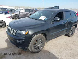 2018 Jeep Grand Cherokee Laredo E with VIN 1C4RJEAG4JC311699, listed as a IAAI auction lot 41876920 with 42,584 mi miles and . Bid and sale history available at DreamBid. Image 2.