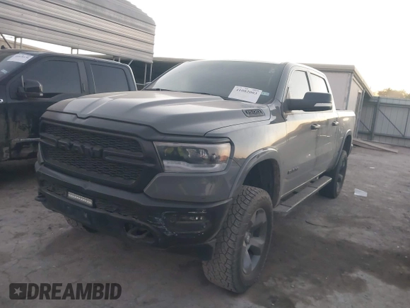2020 Ram 1500 Big Horn with VIN 1C6SRFFT0LN380054, listed as a IAAI auction lot 41082003 with 112,434 mi miles and . Bid and sale history available at DreamBid. Image 2.