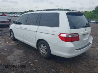 2005 Honda Odyssey EX-L with VIN 5FNRL38705B085917, listed as a IAAI auction lot 42210776 with 296,056 mi miles. Bid and sale history available at carsss.com. Image 3.