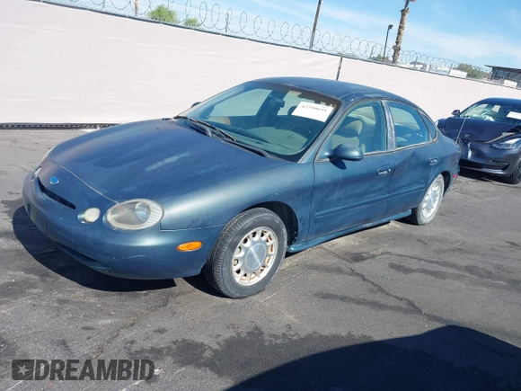 1996 Ford Taurus LX with VIN 1FALP53S0TG125665, listed as a IAAI auction lot 42290691 with 91,152 mi miles and . Bid and sale history available at DreamBid. Image 12.