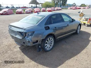 2018 Audi A4 Premium z VIN WAUDNAF47JN017558, wystawiony jako IAAI lot #42233399 z przebiegiem 107 982 mil mil oraz . Historia ofert i sprzedaży dostępna na DreamBid. Obrazek 4.