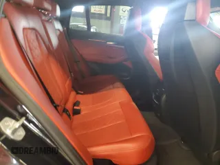 2020 BMW X4 M z VIN 5YMUJ0C06LLA99799, wystawiony jako Copart lot #65583704 z przebiegiem 32 033 mil mil oraz Szkoda całkowita • Salvage title. Historia ofert i sprzedaży dostępna na DreamBid. Obrazek 11.