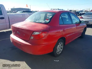 2002 Kia Rio with VIN KNADC123126182360, listed as a IAAI auction lot 41526651 with 82,052 mi miles. Bid and sale history available at carsss.com. Image 4.