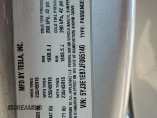 2018 Tesla Model 3 Long Range Battery z VIN 5YJ3E1EB7JF065140, wystawiony jako Copart lot #51916035 z przebiegiem 110 709 mil mil oraz Szkody całkowita. Historia ofert i sprzedaży dostępna na DreamBid. Obrazek 15.