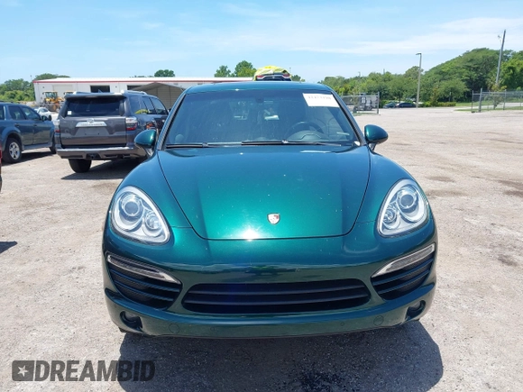 2014 Porsche Cayenne with VIN WP1AA2A21ELA06570, listed as a IAAI auction lot 42473298 with 61,421 mi miles and . Bid and sale history available at DreamBid. Image 13.