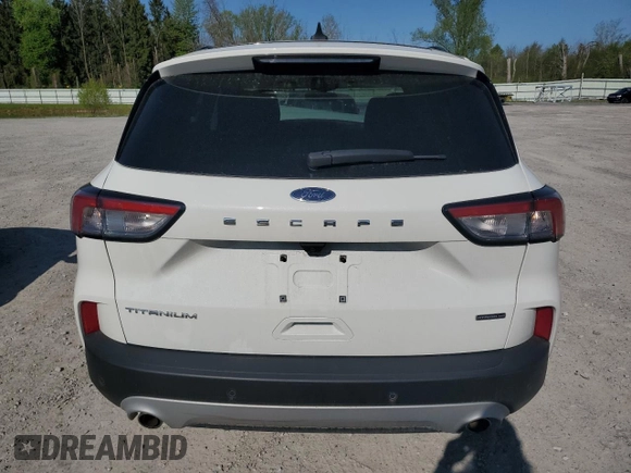 2020 Ford Escape Titanium Hybrid z VIN 1FMCU9DZ4LUC12763, wystawiony jako Copart lot #56589615 z przebiegiem Nie podano mil oraz Szkoda całkowita • Salvage title. Historia ofert i sprzedaży dostępna na DreamBid. Obrazek 6.