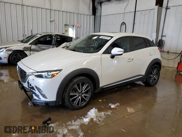 2018 Mazda CX-3 Grand Touring z VIN JM1DKFD7XJ0321776, wystawiony jako Copart lot #49093765 z przebiegiem 94 770 mil mil oraz Tytuł czysty. Historia ofert i sprzedaży dostępna na DreamBid. Obrazek 1.