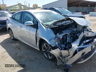 2022 Toyota Prius L Eco with VIN JTDKAMFU3N3190048, listed as a IAAI auction lot 41982252 with 19,189 mi miles and . Bid and sale history available at DreamBid. Image 1.