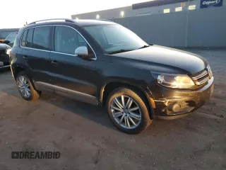 2012 Volkswagen Tiguan S with VIN WVGBV7AX9CW583728, listed as a Copart auction lot 82422184 with 151,557 mi miles and Salvage Title. Bid and sale history available at DreamBid. Image 4.