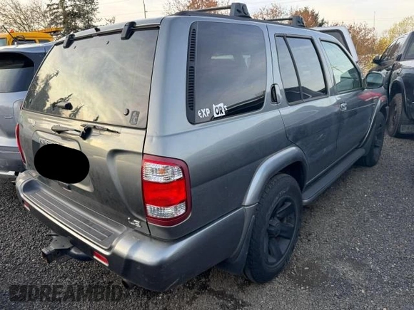 2004 Nissan Pathfinder SE with VIN JN8DR09Y64W905091, listed as a Copart auction lot 57692615 with 238,457 mi miles and Clean title. Bid and sale history available at DreamBid. Image 4.