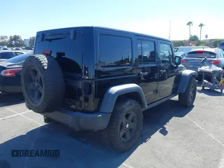 2008 Jeep Wrangler Unlimited Rubicon with VIN 1J8GA69108L574773, listed as a IAAI auction lot 42714300 with 106,974 mi miles and . Bid and sale history available at DreamBid. Image 4.