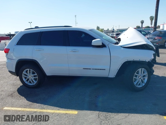 2018 Jeep Grand Cherokee Laredo E with VIN 1C4RJEAGXJC260645, listed as a IAAI auction lot 42002545 with Not provided miles and . Bid and sale history available at DreamBid. Image 13.